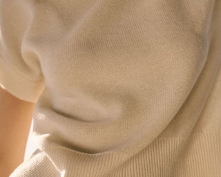 Close-up of a person wearing a Cashmere knit 